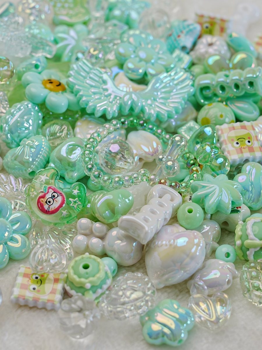 Mint green bead mix with wings, flowers and pearl hearts